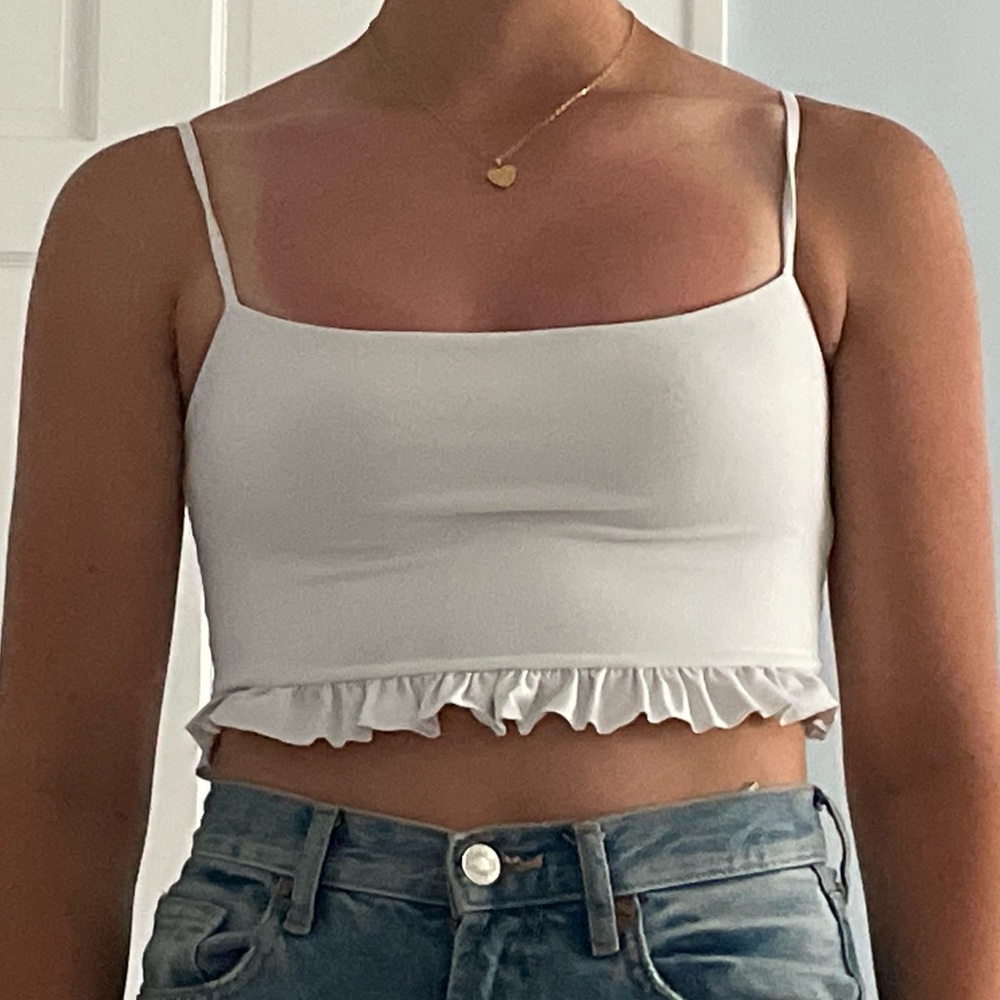 Cropped white ruffle tank